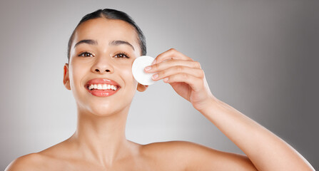 Portrait, mockup or woman with cotton pad for skincare, wellness or healthy facial skin in studio....
