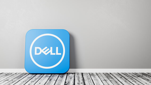Dell App Icon on Wooden Floor Against Wall