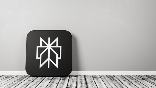 Perplexity App Icon on Wooden Floor Against Wall