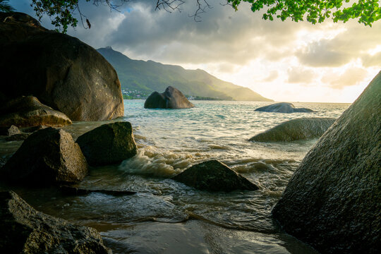 Idyllic Paradise: Serene White Sand Beaches and Tranquil Ocean on a Sunny Day in Seychelles