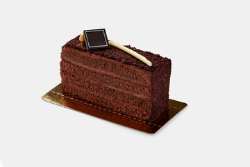 Chocolate truffle pastry with crunchy streusel and branding plaque