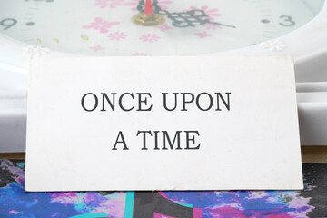ONCE UPON A TIME text text on a white card