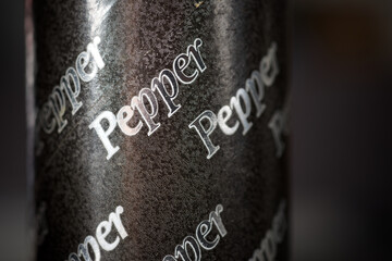 Close-up of a jar of pepper for culinary use.