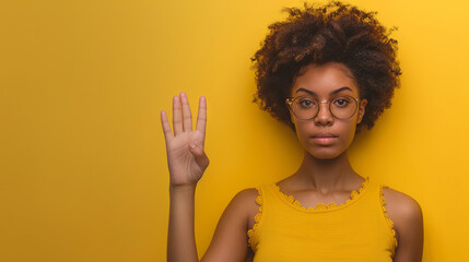 African American woman hand signal for help, abuse, domestic violence, pressing thumb to palm....