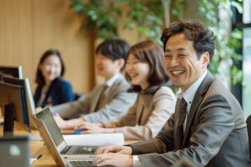 Business people team working with laptops on a table in an office.