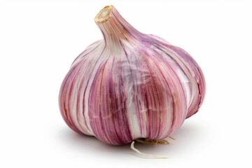 Close-up of a single garlic bulb with a purple hue isolated on a white background, showcasing its natural texture and color.