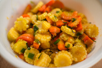 sauté carrots and baby corn