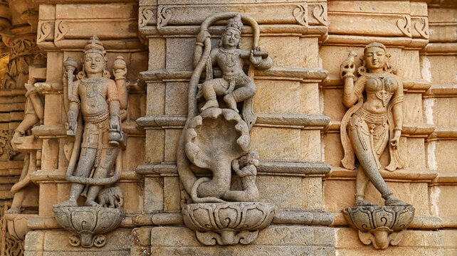Carving Sculpture of Lord Krishna Dancing on Snake Kaliya Mardan, Mangalay Temples, Ratlam, Madhya Pradesh India.