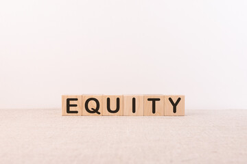 EQUITY word made with building blocks on a light background