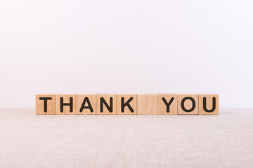 THANK YOU word made with building blocks on a light background
