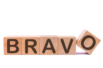 BRAVO word made with building blocks on a light background