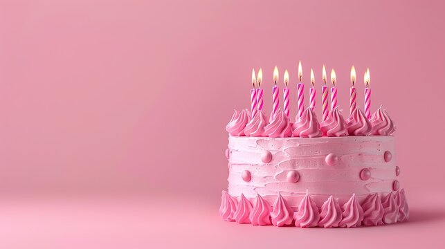 Pink birthday cake on pink background with copy space area