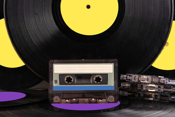 Vinyl record and audio cassette. Retro audio media.