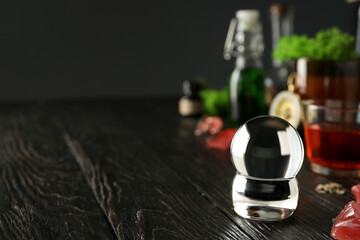 Magic orb of a witch, for divination of the future, on a dark background.