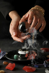 Magic orb of a witch, for divination of the future, on a dark background.