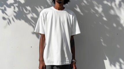 An oversized white t-shirt with a simple unisex design