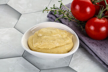 Dijon mustard sauce in the bowl