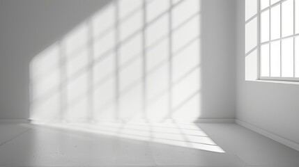 Fototapeta premium White minimal wall with light shadows from a window
