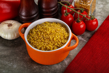 Dry wheat bulgur cereal heap