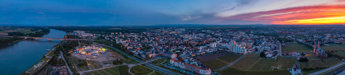 Fototapeta premium worms germany and rhine river pfigstmarkt folk festival 2024 evening earial