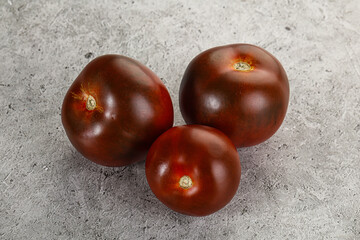 Obraz premium Organic natural juicy Kumato tomato