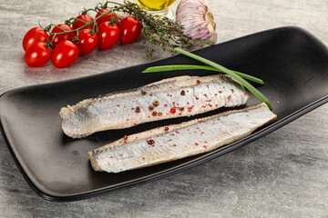 Marinated herring fillet with green onion