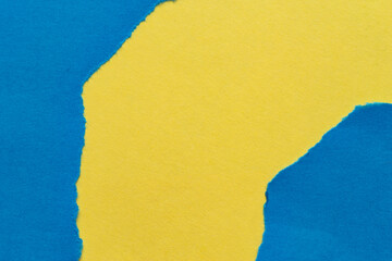 破れた青色と黄色の紙の背景