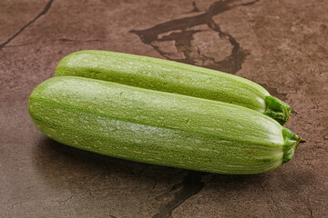 Raw green ripe zucchini vegetable