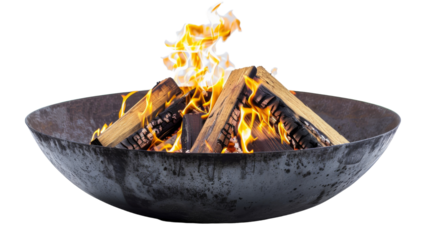A fire pit ablaze with flames burning brightly inside, casting a warm glow in the surroundings