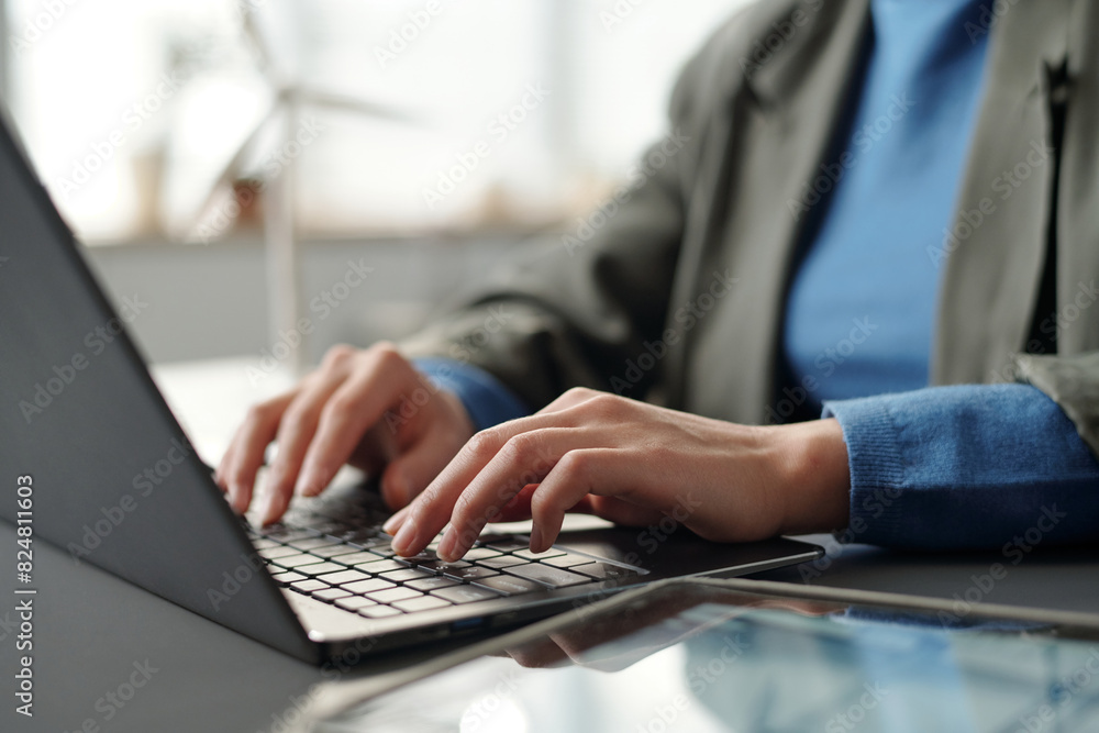 Aufkleber hands of young unrecognizable businesswoman in smart casualwear touching keys of laptop keyboard dur