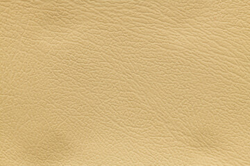 Synthetic leather yellow background texture. Abstract