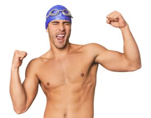 Young Hispanic man with swim gear raising fist after a victory, winner concept.