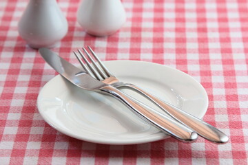 Knife and fork with plate