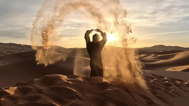 throw sand in the Sahara desert