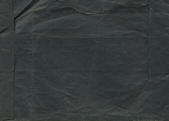 Scratches recycled black paper for design. Distressed overlay surface. Black shabby aged photo...