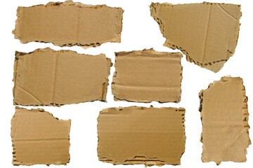 set of ripped cardboard corrugated pieces isolated on transparent background, collection of torn carton shape, Ideal for signs, labels, banners, design elements, cut-out. PNG, top view / flat lay