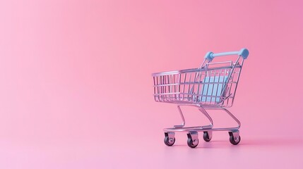 Small shopping cart on a pink background