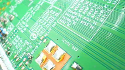 In this close-up masterpiece, a Printed Circuit Board (PCB) unveils its secrets. The symphony of components dances in intricate patterns. Innovation concept.
