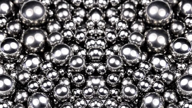 steel bearing balls on a turn table, mirrored