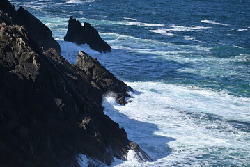 waves crashing on rocks