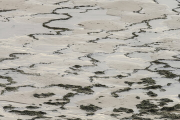 Tide Patterns on Sand at Vila Nova de Milfontes, Portugal