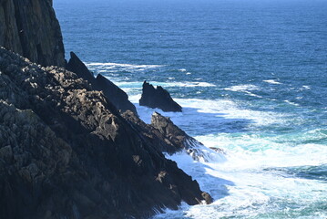 waves crashing on rocks
