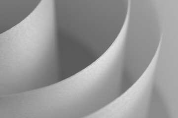 Abstract background of white satin ribbons