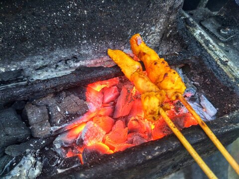 The making of Sate Padang or Padang Satay, a specialty satay from Minangkabau cuisine, West Sumatera, Indonesia