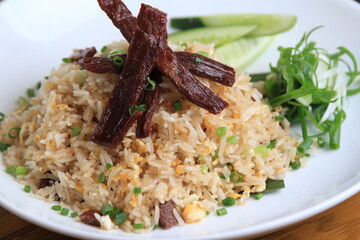 Homemade special Thai Fried Rice with Sun-dried meat, fried with oil, used on medium heat, not cooked until crispy.