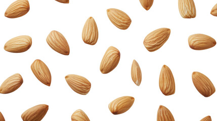 Obraz premium A collection of almonds scattered on a clean white surface