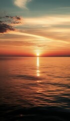 Obraz premium Evening Elegance Sunset Over the Sea in Subdued Tones