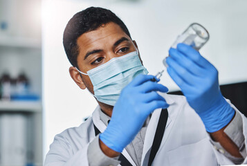 Man, lab and science with vial or syringe, research and test drug for immunology experiment in pharmaceuticals. Glass bottle, face mask and healthcare professional, mrna vaccine and immunization