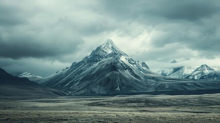Fototapeta premium distinctive lone mountain peak rising amidst vast landscape in dramatic isolation stunning nature photography