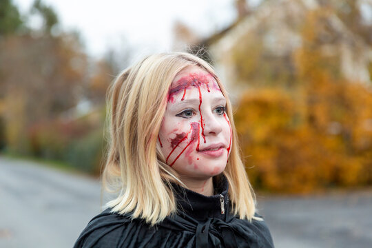 Blond girl with Halloween make-up